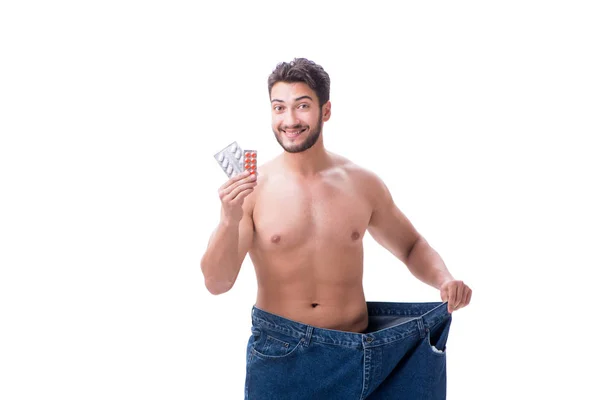 Człowiek w diety koncepcja z ponadgabarytowych dżinsy — Zdjęcie stockowe