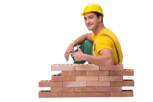 The handsome construction worker building brick wall — Stock Photo, Image