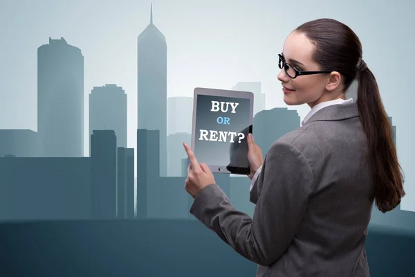 Businesswoman facing dilemma of buying versus renting — Stock Photo, Image