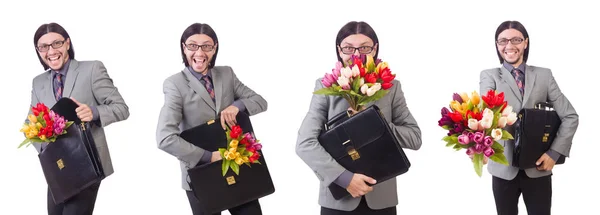 Man met bloemen geïsoleerd op de witte — Stockfoto