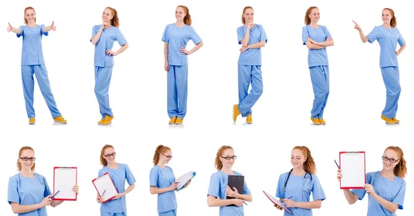 Bonito médico en uniforme azul aislado en blanco — Foto de Stock