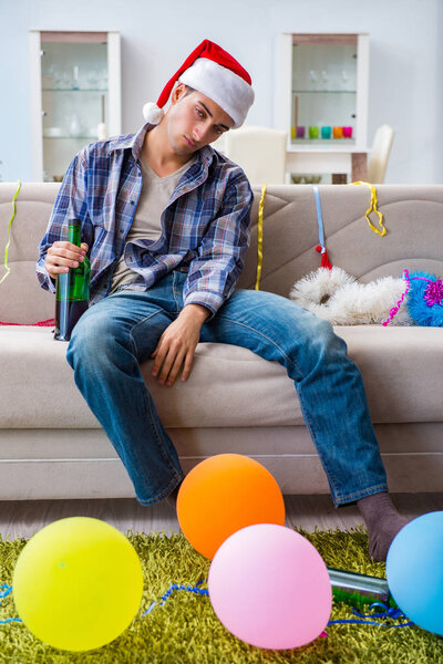 Man having hangover after christmas party