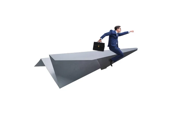Biznesmen lecący papierowym samolotem w koncepcji biznesowej — Zdjęcie stockowe
