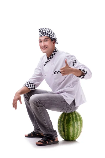 Ung manlig kock med vattenmelon isolerad på vitt — Stockfoto