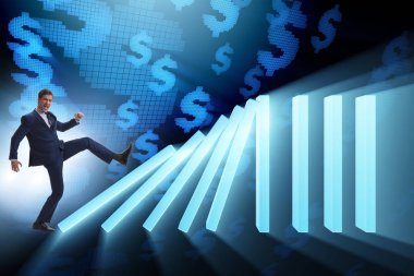 Domino etkisi iş konseptinde iş adamı