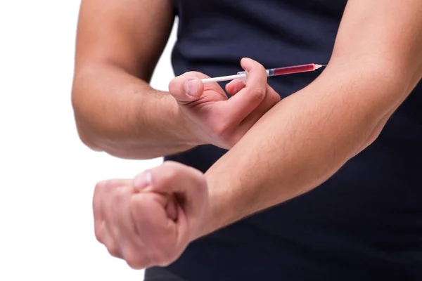 Junger Mann im Doping-Konzept isoliert auf weißem Grund — Stockfoto