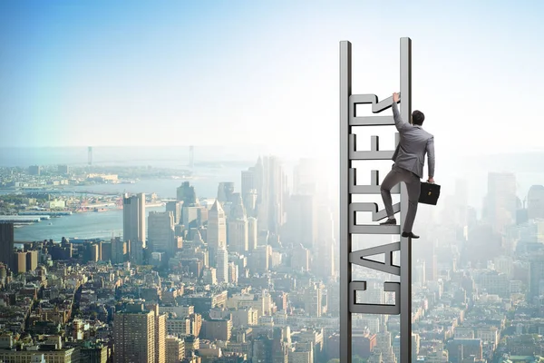 Businessman in career ladder concept — Stock Photo, Image
