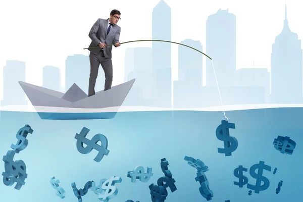 Geschäftsmann fischt Geld aus Papierschiff — Stockfoto