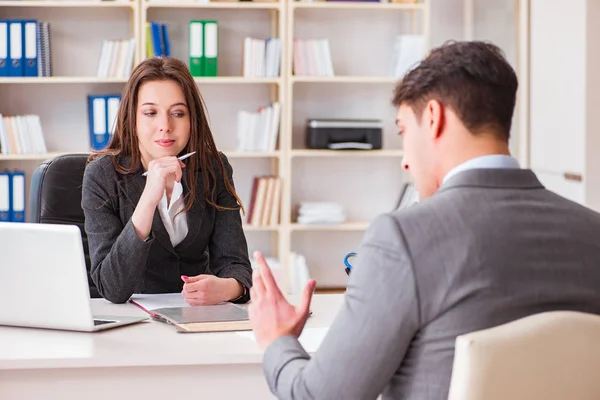 Business meeting between businessman and businesswoman — Stock Photo, Image