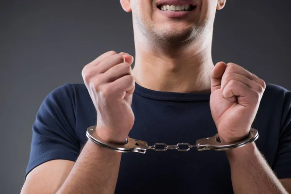 Man with his hands handcuffed in criminal concept — Stock Photo, Image