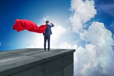 Süper kahraman iş adamı binanın tepesinde meydan okumaya hazır.