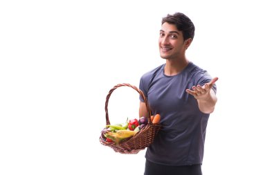 Sağlıklı beslenmenin ve spor yapmanın faydalarını destekleyen bir adam.