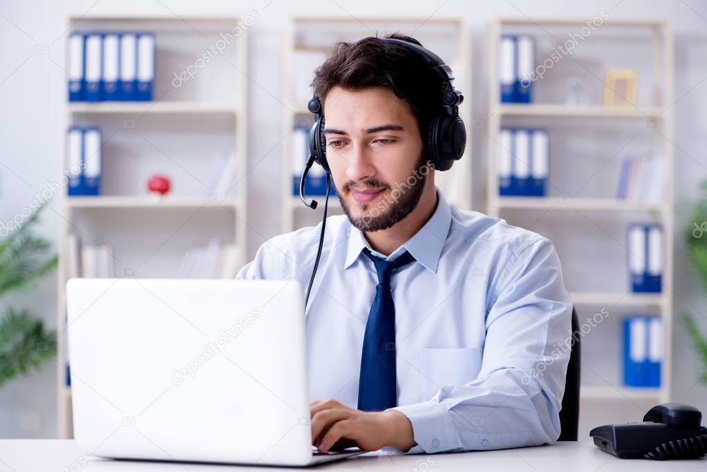 Call center employee working in office