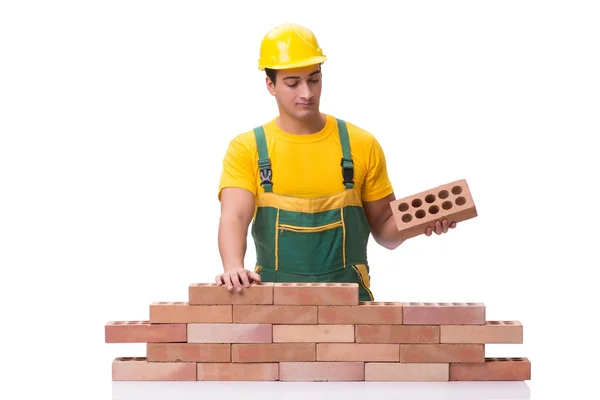 The handsome construction worker building brick wall — Stock Photo, Image