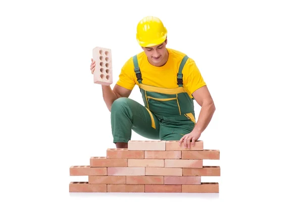 The handsome construction worker building brick wall — Stock Photo, Image