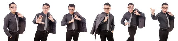 Hombre joven en traje gris aislado en blanco —  Fotos de Stock