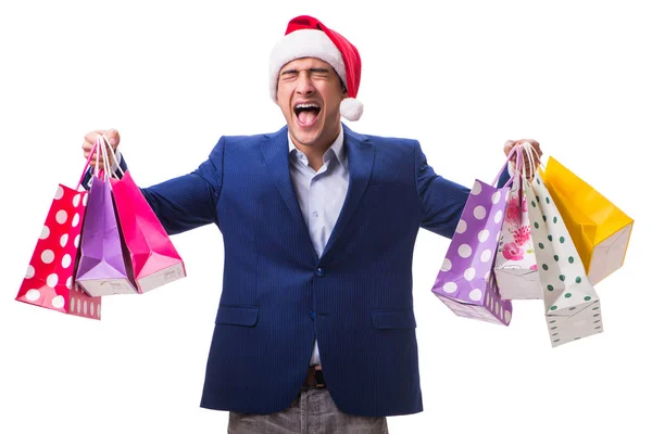 Jongeman met tassen na kerst winkelen op witte achtergrond — Stockfoto