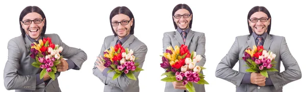 Uomo con fiori isolati sul bianco — Foto Stock