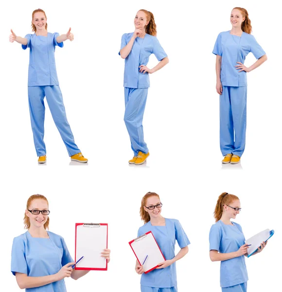Hübscher Arzt in blauer Uniform isoliert auf weißem Grund — Stockfoto