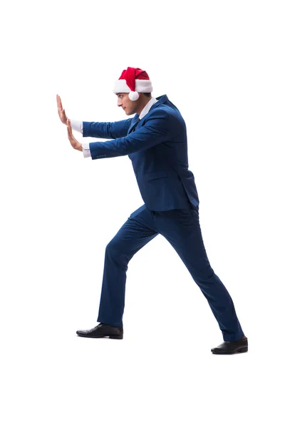 Genç busnessman Noel kavramı üzerinde beyaz Noel Baba şapkası giyiyor — Stok fotoğraf