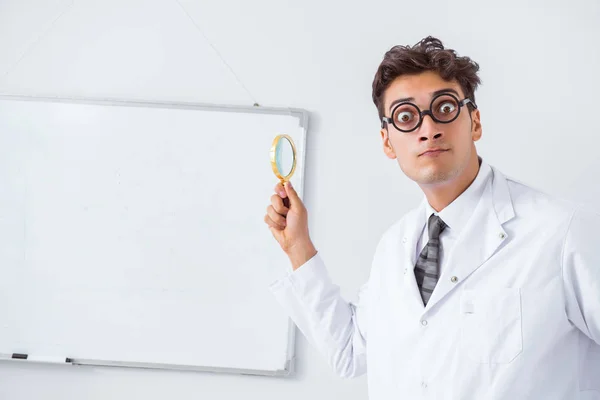 Funny doctor scientist making presentation in hospital — Stock Photo, Image