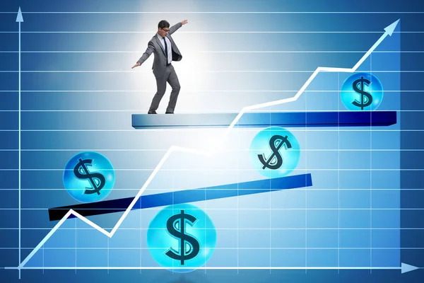Businessman balancing in financial dollar concept — Stock Photo, Image