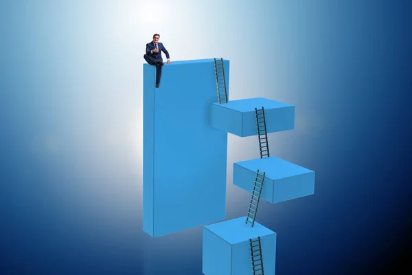 Zakenman klimblokken in carrière ladder business concept — Stockfoto