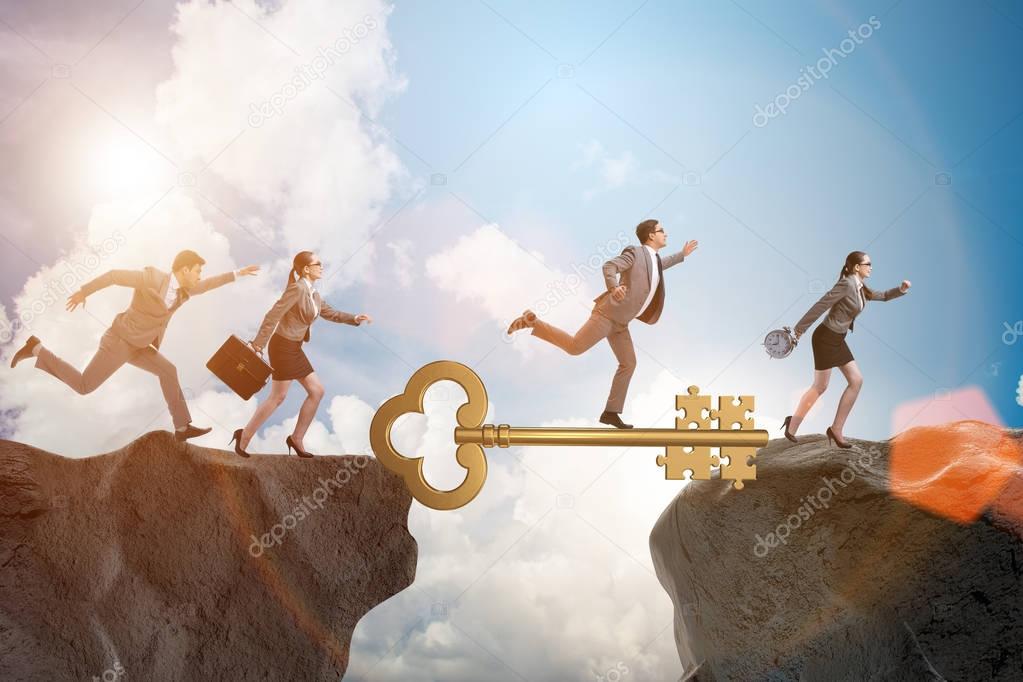 Business people chasing each other towards key to success