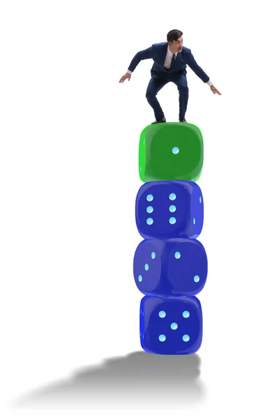 Businessman balancing on top of dice stack in uncertainty concep — Stock Photo, Image