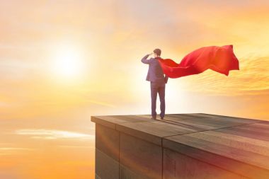 Süper kahraman iş adamı binanın tepesinde meydan okumaya hazır.