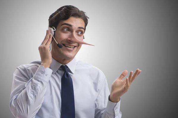 Geschäftsmann lügt seinen Gegner am Telefon an — Stockfoto