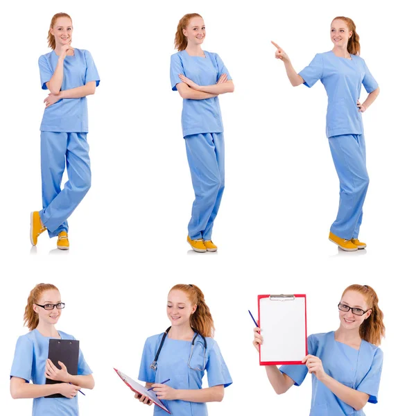 Bonito médico en uniforme azul aislado en blanco — Foto de Stock