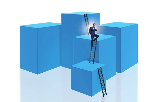 Uomo d'affari in cima al blocco isolato su bianco — Foto Stock