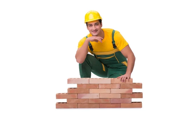 レンガの壁を構築するハンサムな建設労働者 — ストック写真