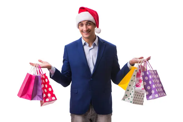 白い背景にクリスマスの買い物の後の袋を持つ若い男 — ストック写真