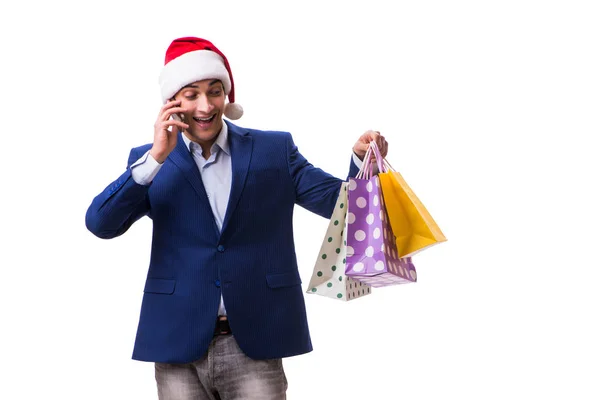 Giovane uomo con borse dopo lo shopping di Natale su sfondo bianco — Foto Stock