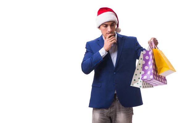 Young man with bags after christmas shopping on white background — Stock Photo, Image