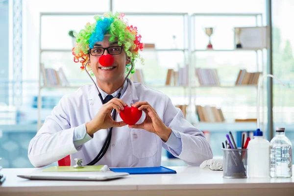 Child cardiologist with stethoscope and red heart — Stock Photo, Image