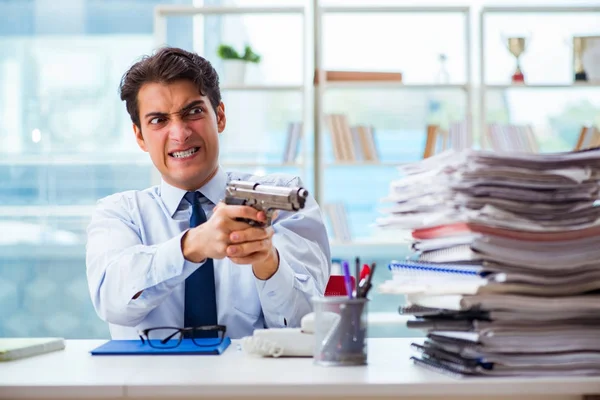 Angry businessman with gun thinking of committing suicide — Stock Photo, Image