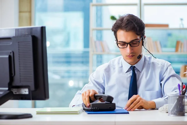 Unhappy angry call center worker frustrated with workload