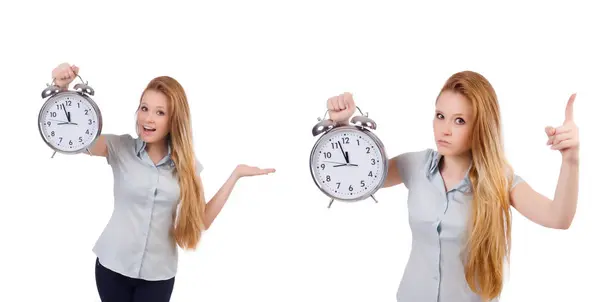Young woman with clock on white — Stock Photo, Image