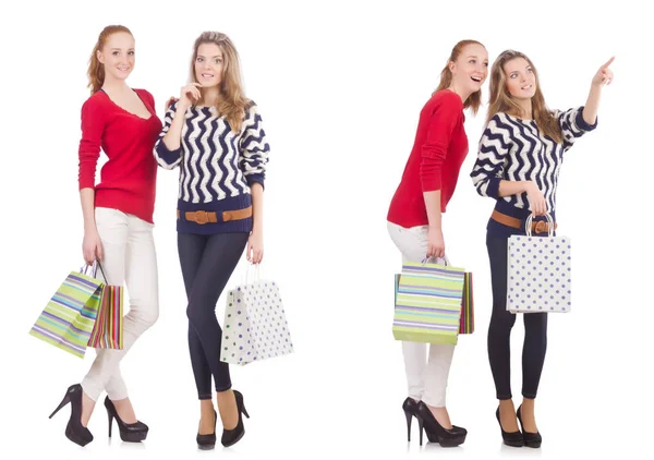 Amici con shopping bags isolati su bianco — Foto Stock