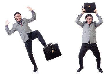 Evrak çantası üzerinde WHI izole tutan gri elbiseli genç işadamı