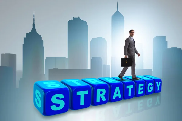 Empresario en estrategia concepto de negocio — Foto de Stock