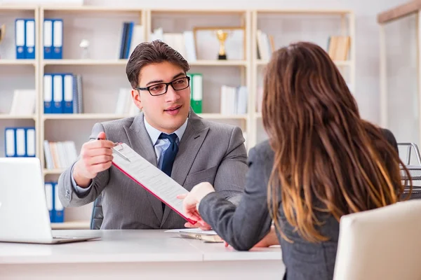 Business meeting between businessman and businesswoman — Stock Photo, Image