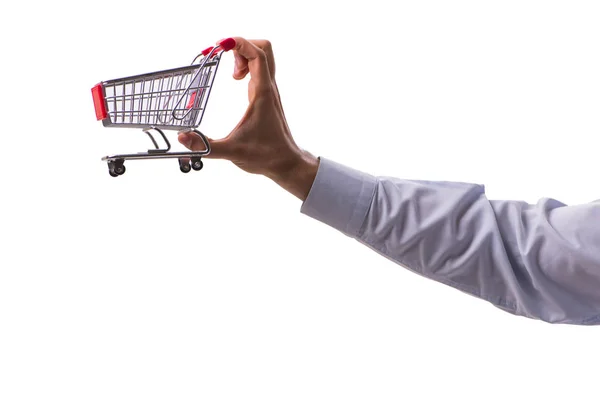 Mão segurando carrinho de compras isolado no branco — Fotografia de Stock