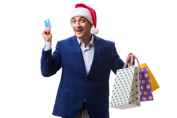 Молодой человек с сумками после Рождества покупки на белом фоне — стоковое фото