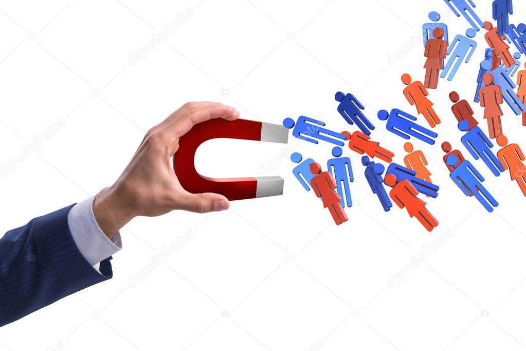 Businessman in recruitment concept with horseshoe magnet