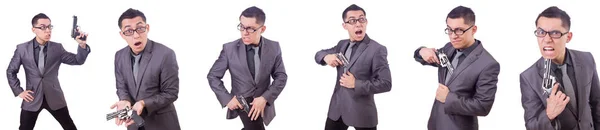 Divertido hombre de negocios con pistola en blanco —  Fotos de Stock