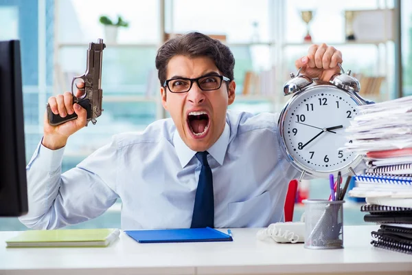 Angry businessman with gun thinking of committing suicide — Stock Photo, Image